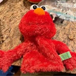 Sesame Street Red Elmo Puppet with Orange Nose